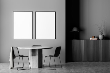 Two empty mockup canvases in grey dining room area