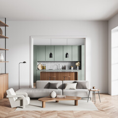 Light kitchen interior with sofa and table with chairs, shelf and kitchenware