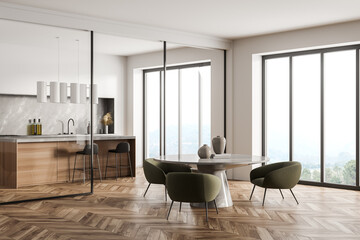 Light kitchen interior with seats and table, kitchenware with window