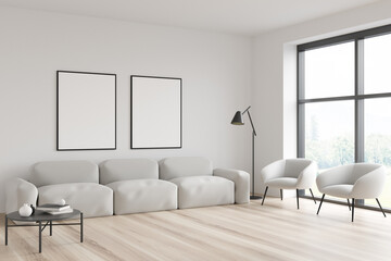 Corner view of two canvases in white living room