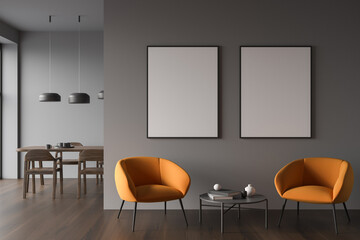 Grey seating area with two canvases and dining room on background