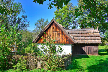 Obraz premium A traditional Polish wooden house in ethnographic park in Nowy Sacz, Poland