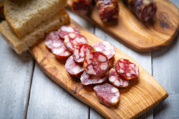 Slices of cured meat sausage