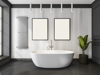 Fototapeta na wymiar Two canvases on white wood wall and round bathtub in modern bathroom
