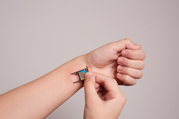 Bionic microchip inside human hand. Future technology and cybernetics concept