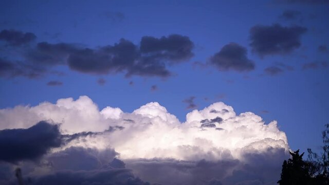 clouds in the sky weather partly cloudy, Clouds Move Smoothly in the Blue Sky. Timelapse. Cloud space. Sunny blue sky with light clouds