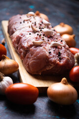Raw pork prepared for roasting