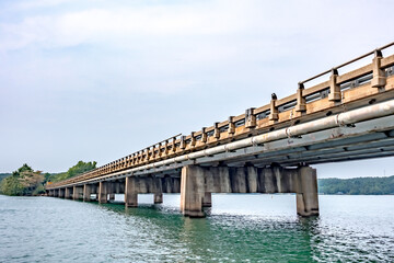 Fototapeta na wymiar highway bridge overpass over the lake
