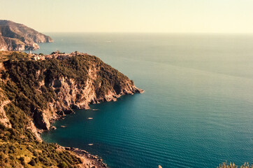 Approaching the village of Corniglia in the Cinque Terre in Italy in a summer afternoon, shot with analogue film technique