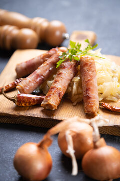 Grilled german sausage links with sauerkraut