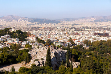 Fototapeta na wymiar Areopagus and city panorama as viewed from the Acropolis. Athens, Greece