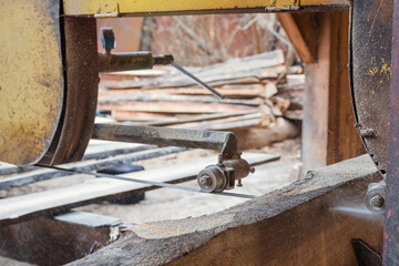 Wood processing on a sawmill. Sawing and drying of wood. Woodworking industry