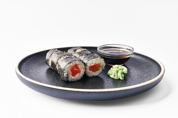  Plate of salmon sushi makis isolated on white background