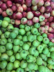 lots of ripe sweet apples for food as a background