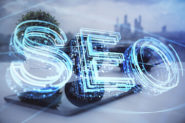Double exposure of SEO drawing and cell phone background. Concept of data search optimization