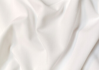 Obraz premium White crumpled or wavy fabric texture background. Abstract linen cloth soft waves. Creases of satin, silk, and cotton. Smooth elegant silk or atlas luxury cloth texture. Bedding Sheets or blanket.