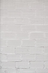 Brick wall texture with cracked tiles and cement. Classic brickwall surface background