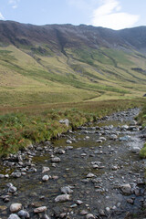 Fototapeta na wymiar Rocks in stream Honister Pass Lake District