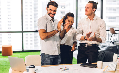 Group of professional business meeting analyzing data and discussing strategy with new startup project.Creative business people planning and brainstorm with laptop computer in modern office.Teamwork