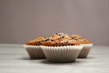 Chocolate chip muffin on white background