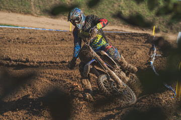 motocross rider jumping in the desert
