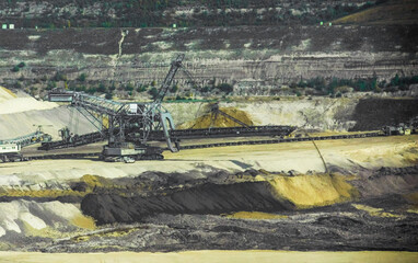 Surface mining in the German Ruhrgebiet. The cons are the hazards it presents to human health and...