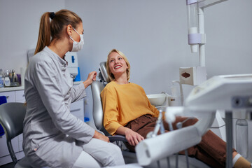 Fototapeta premium Female patient at dental consultation