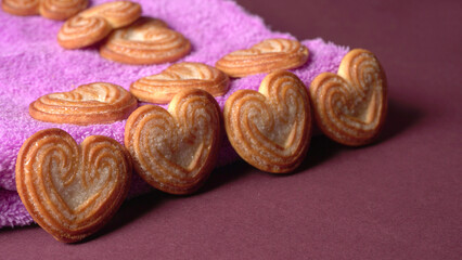 Fototapeta na wymiar Delicious homemade heart shaped cookie on a color background. Top View. Place for text. 