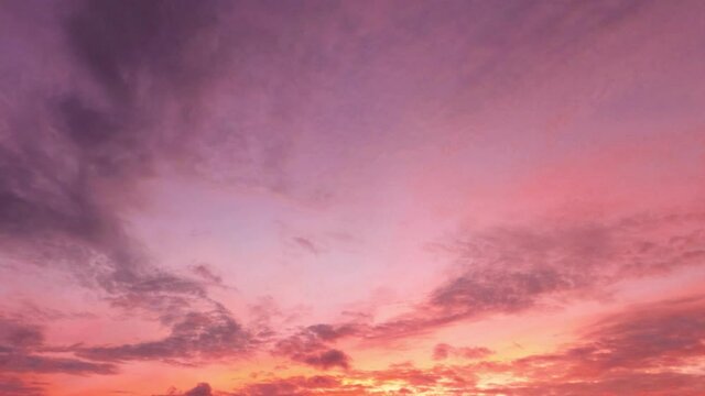 Purple sunrise blue sky n pastel pink yellow clouds