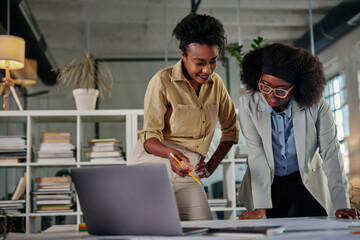 Business partners having meeting in coworking office space