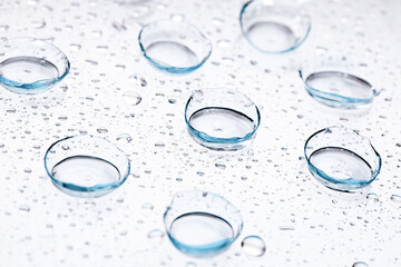 contact lenses with droplets around close up view  - Image