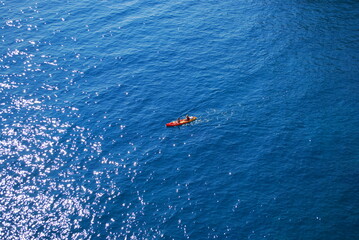 Riding tandem kayak. Double kayak on the sea.