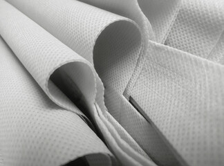 rough texture of white polypropylene fabric. 