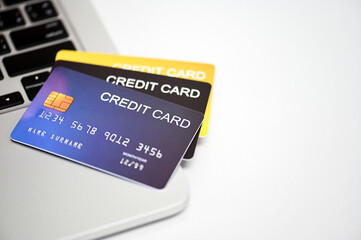 credit card on laptop computer sale concept on desk background