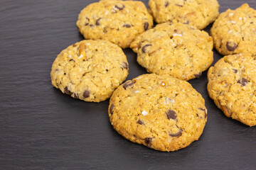 rolled oats chocolate chip peanut butter cookie with pretzel sticks