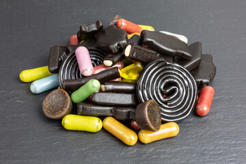 heap of colorful licorice gummy candy