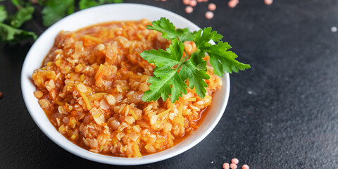 red lentils food stewed legumes spices ready to eat meal snack on the table copy space food background