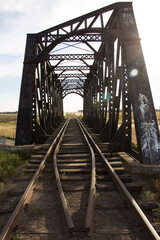 Fototapeta premium english railway bridge at sunset