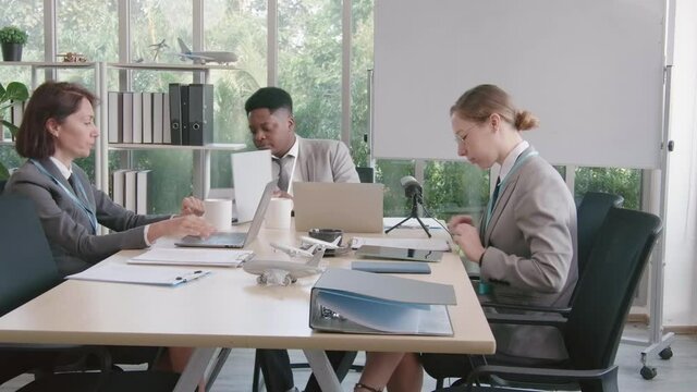 Airline business air hostess and captain aviator in uniform meeting discussion on flight business and training service of stewardess to understand yearly income and promotion
