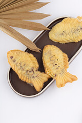 Crispy and warm fish-shaped buns, popular Korean street foods in winter.