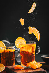 Aromatic tea with cirtus and brown sugar - obrazy, fototapety, plakaty