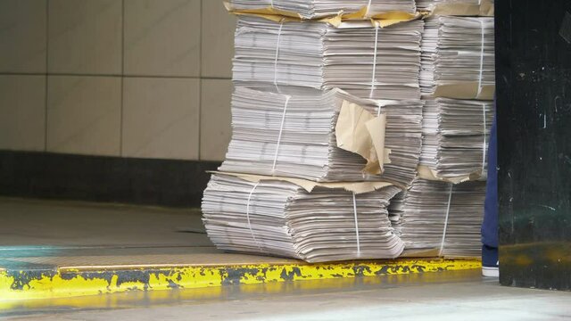 Newspaper sales on the street in 4K slow motion 60fps