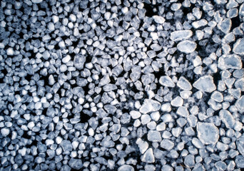 Frozen ice on as a background, a bird's-eye view. Textured surface