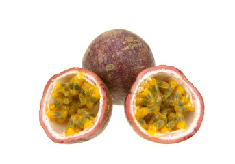 Passion fruit (Passiflora edulis) with cut in half on white background.