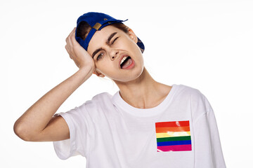 woman wearing white t-shirt lgbt Flag transgender community Protest