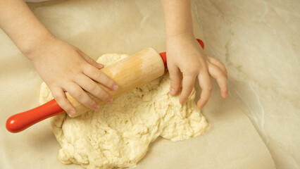 the process of making pizza dough by a child