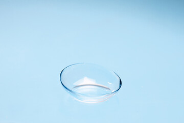 contact lenses on blue backgroundn close up view  - Image