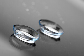 contact lenses on dark background close up view   - Image