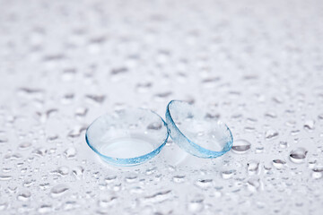 contact lenses with droplets around close up view  - Image
