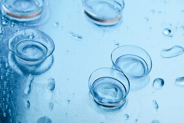 contact lenses with droplets around close up view  - Image